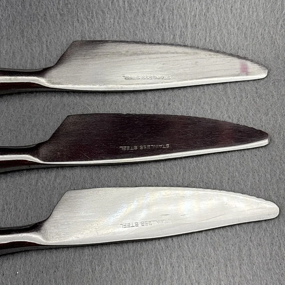SSI Stainless Japan Black Canoe Style Resin Handle Serrated Edge Dinner Knife 6‎